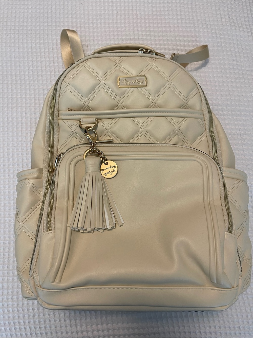 Itzy Ritzy Cream Diaper Bag Backpack + Changing Pad & Dust Bag